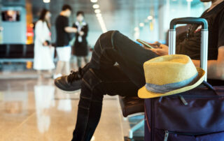 man relaxing in a chair at the airport