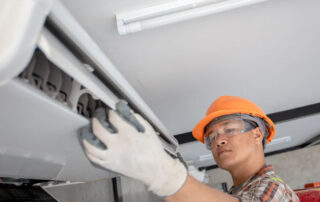 HVAC technician performing mini-split service